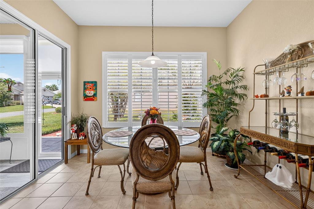 12103 Southeast 176th Loop Summerfield, FL 34491 - Photo 16 of 25 a dining room filled with furniture and window