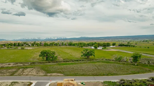 a view of a golf course with a lake