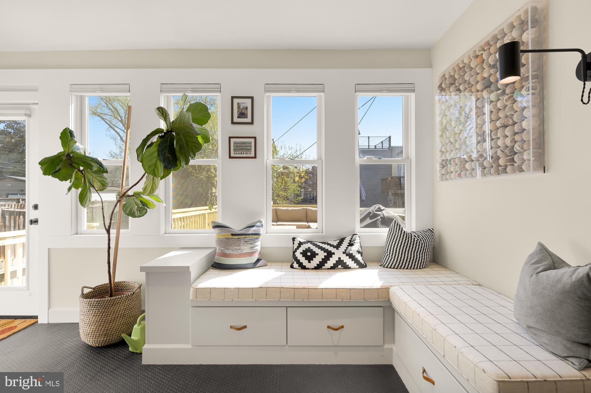 1109 7th Street Northeast Washington, DC 20002 - Photo 12 of 32 a bedroom with furniture and a potted plant