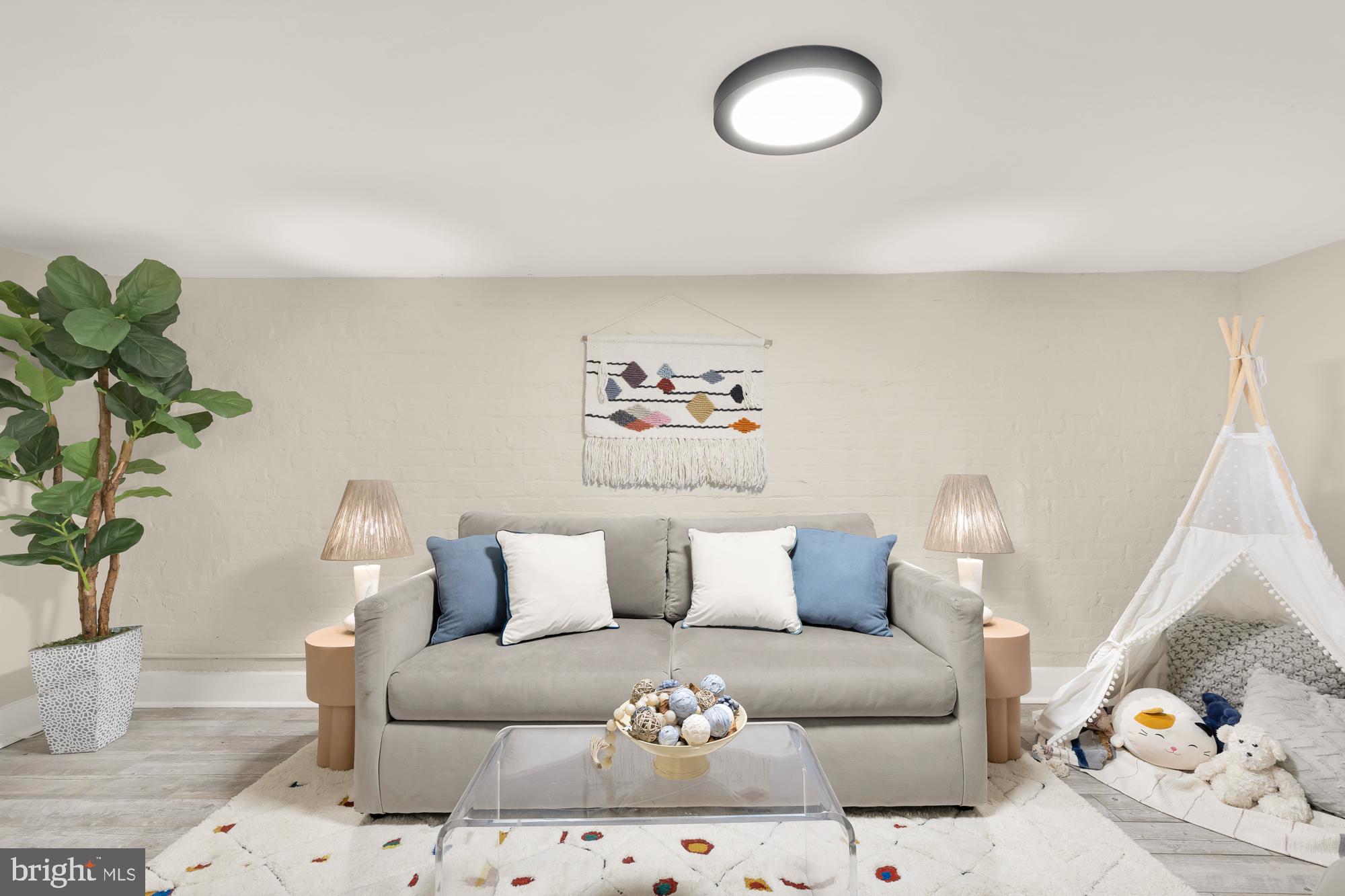 1109 7th Street Northeast Washington, DC 20002 - Photo 24 of 32 a living room with furniture