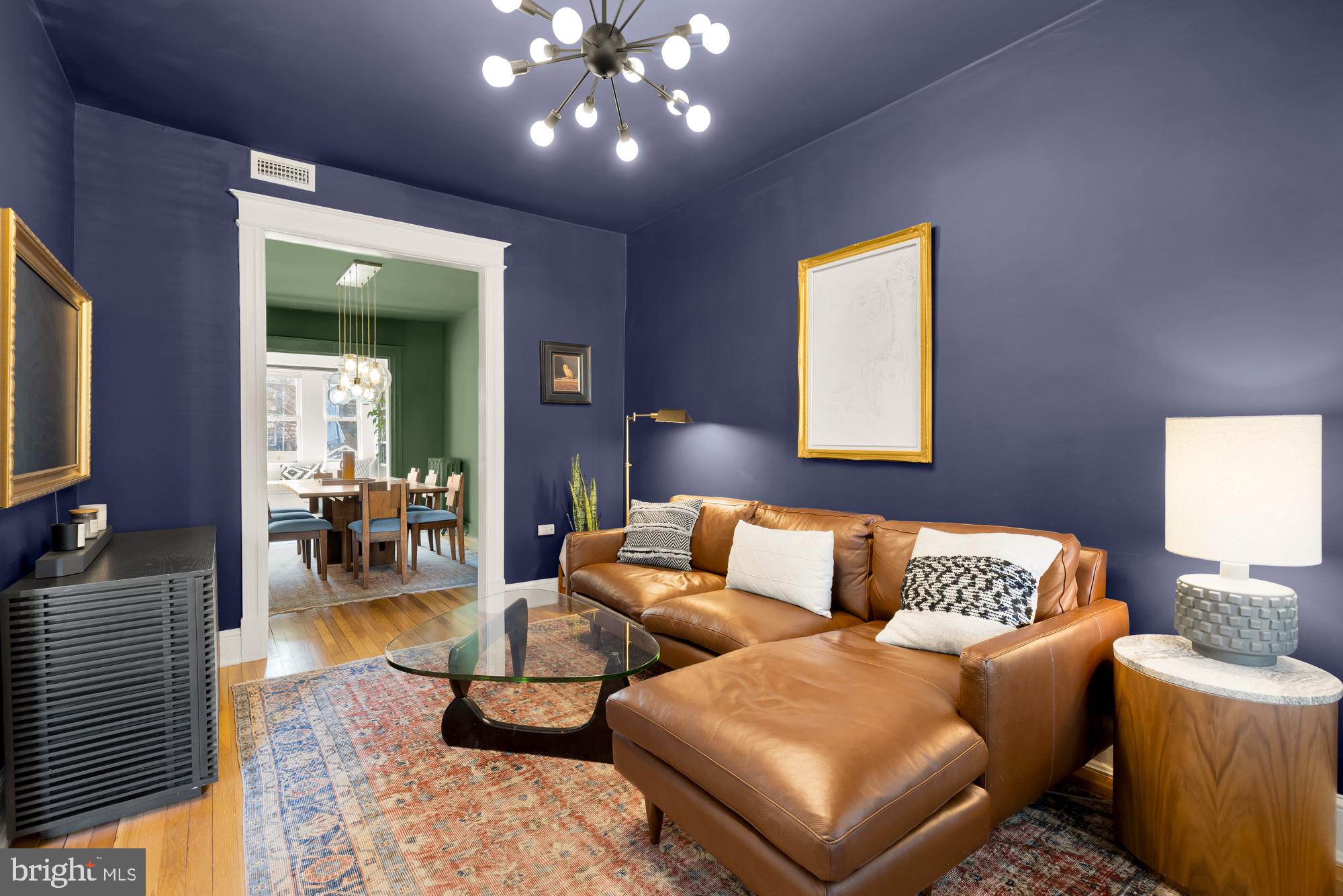 1109 7th Street Northeast Washington, DC 20002 - Photo 6 of 32 a living room with furniture and wooden floor