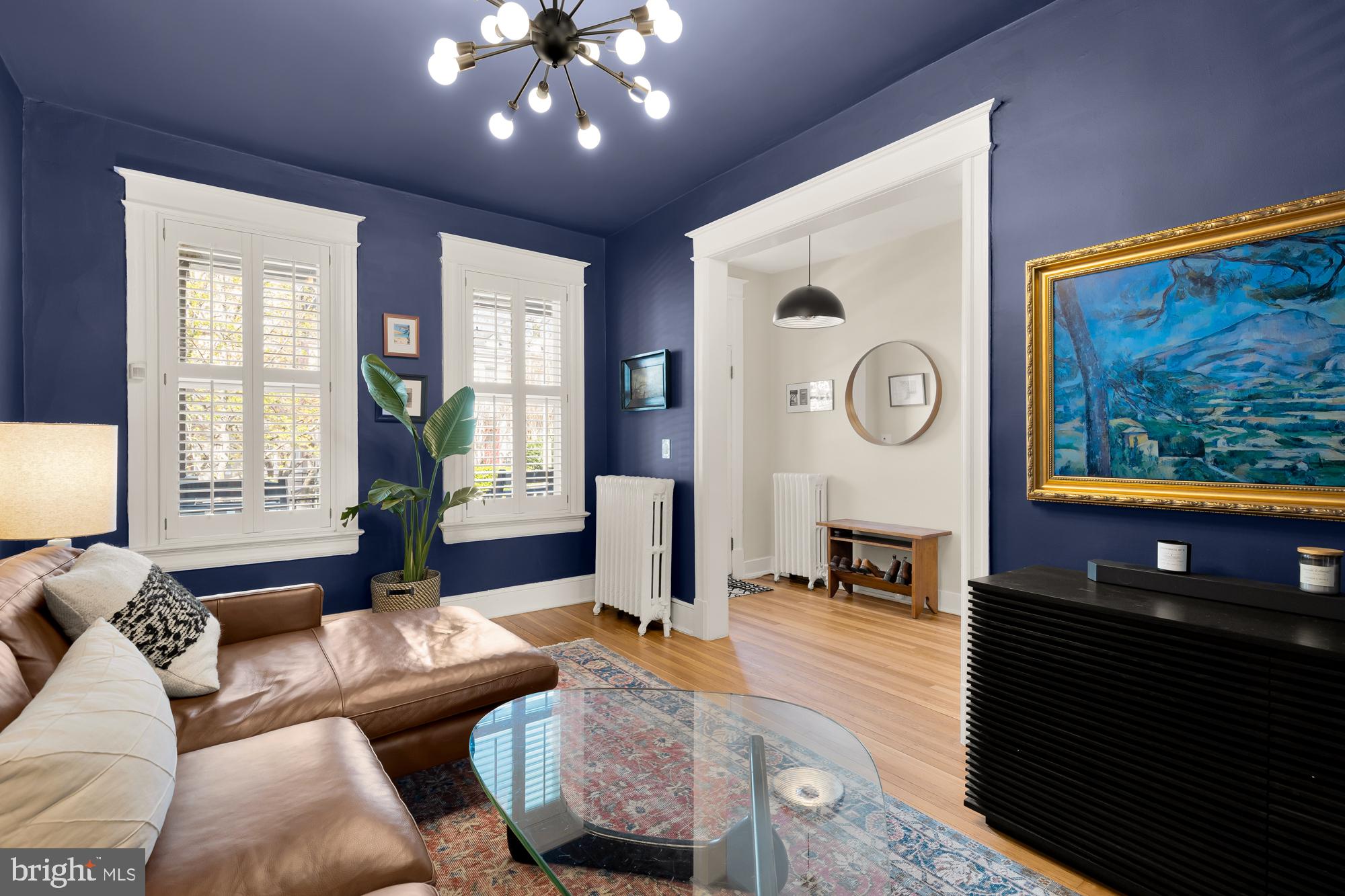 1109 7th Street Northeast Washington, DC 20002 - Photo 8 of 32 a living room with furniture and a flat screen tv