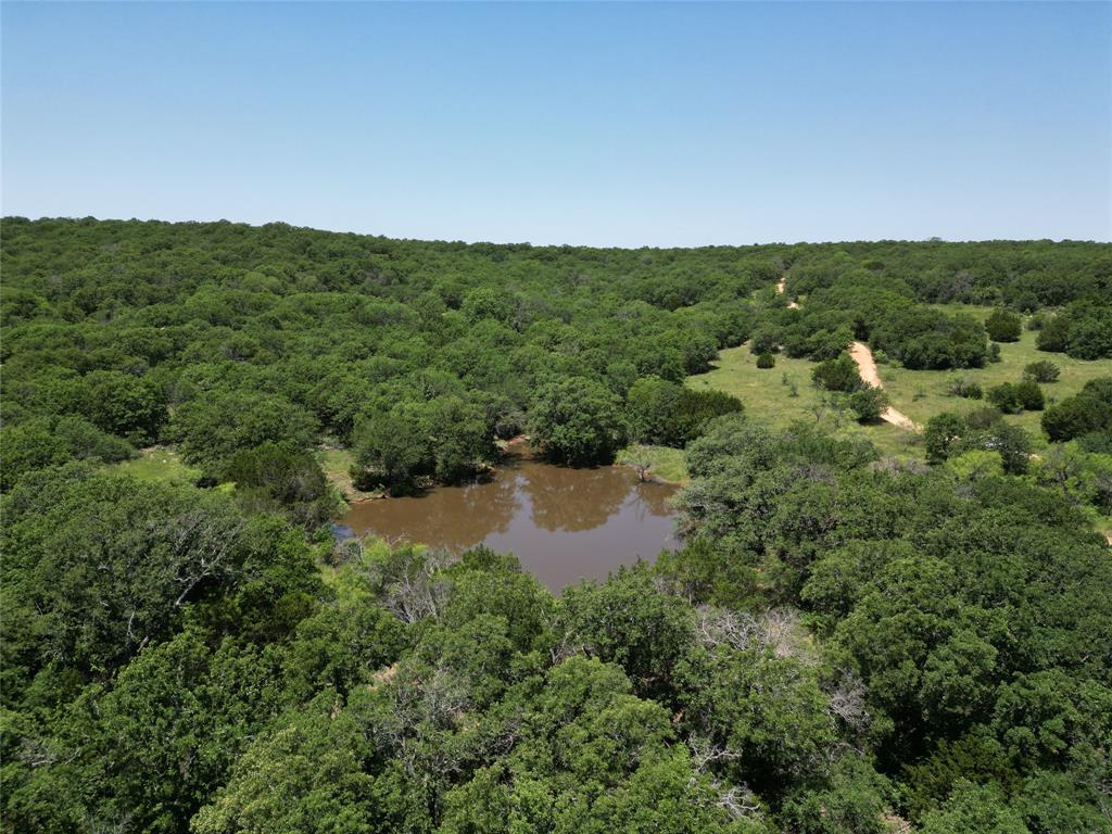 232-acres Tbd 232-acres Tbd Nash Road Jacksboro, TX 76458 - Photo 10 of 30 an aerial view of residential houses with outdoor space and trees
