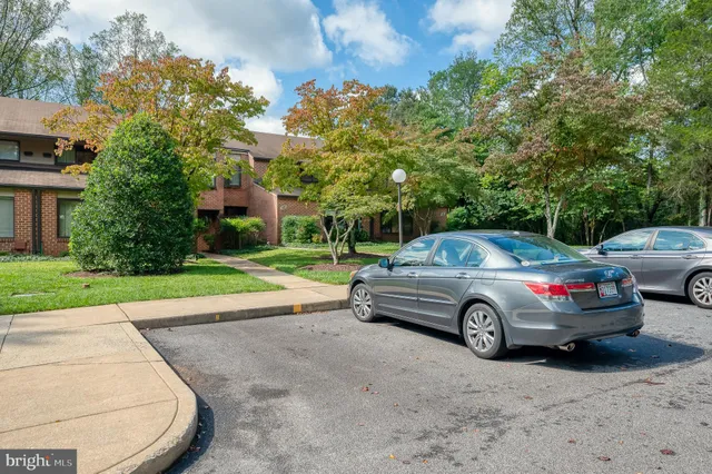 a view of a car parked in a yard
