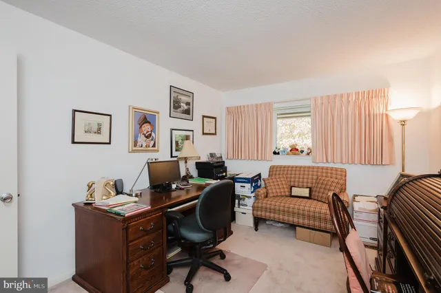 a room with furniture and a window