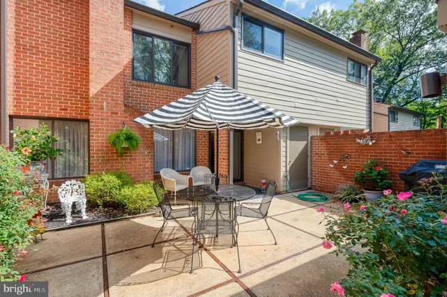 a view of house with a patio