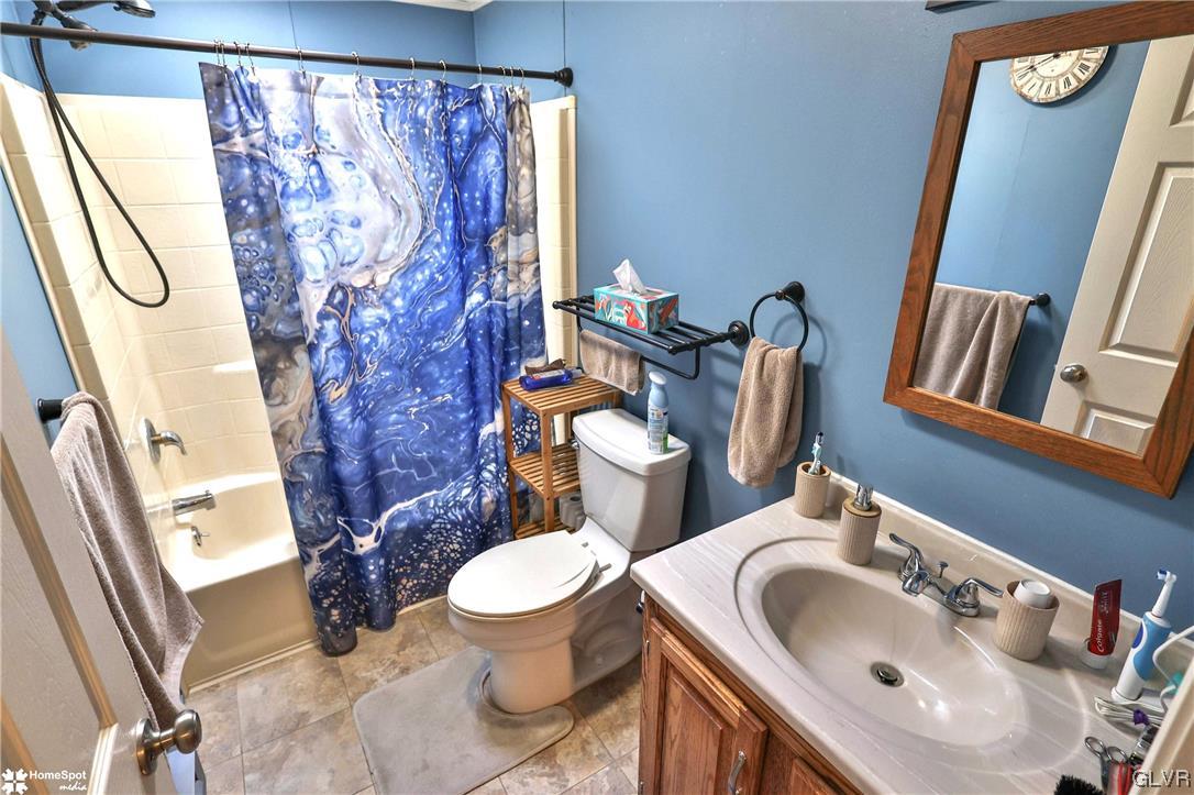 7197 Borman Road New Tripoli, PA 18066 - Photo 21 of 30 a bathroom with a sink and a toilet