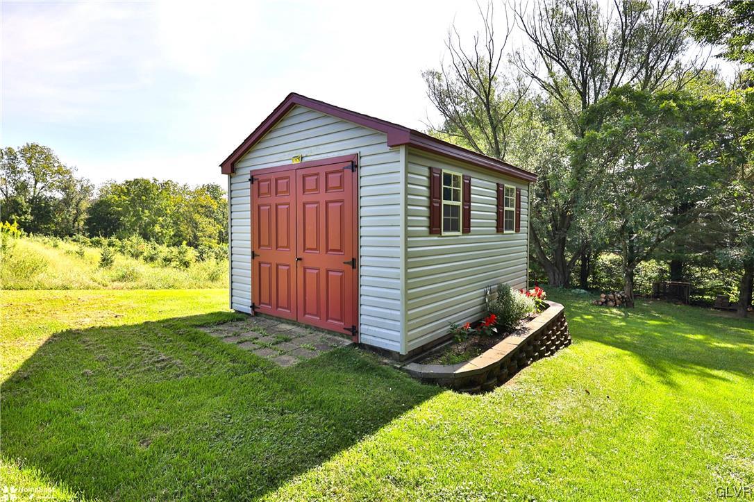 7197 Borman Road New Tripoli, PA 18066 - Photo 28 of 30 a view of a backyard with a garden