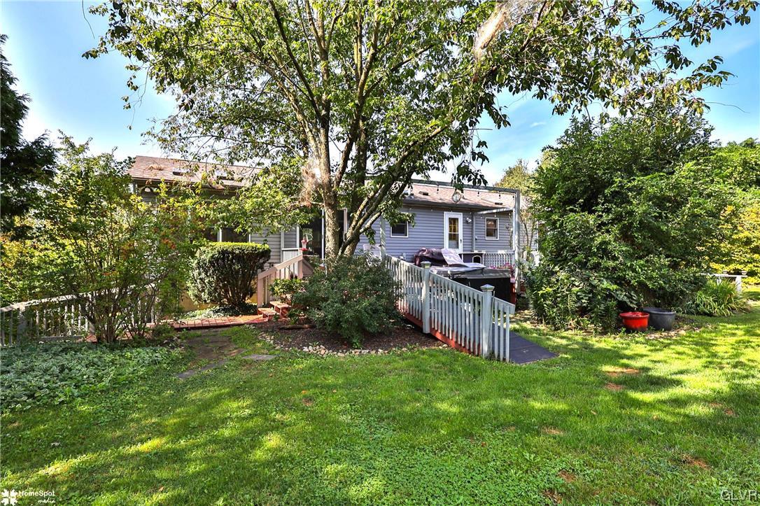7197 Borman Road New Tripoli, PA 18066 - Photo 29 of 30 a front view of a house with a yard and tree
