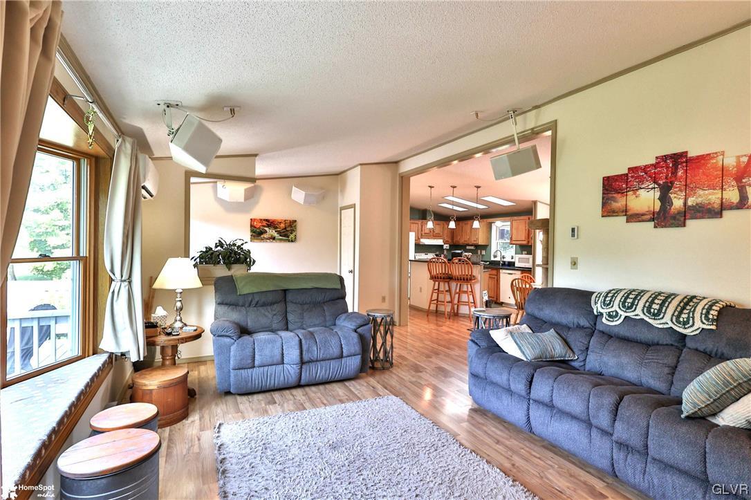 7197 Borman Road New Tripoli, PA 18066 - Photo 5 of 30 a living room with furniture and a large window