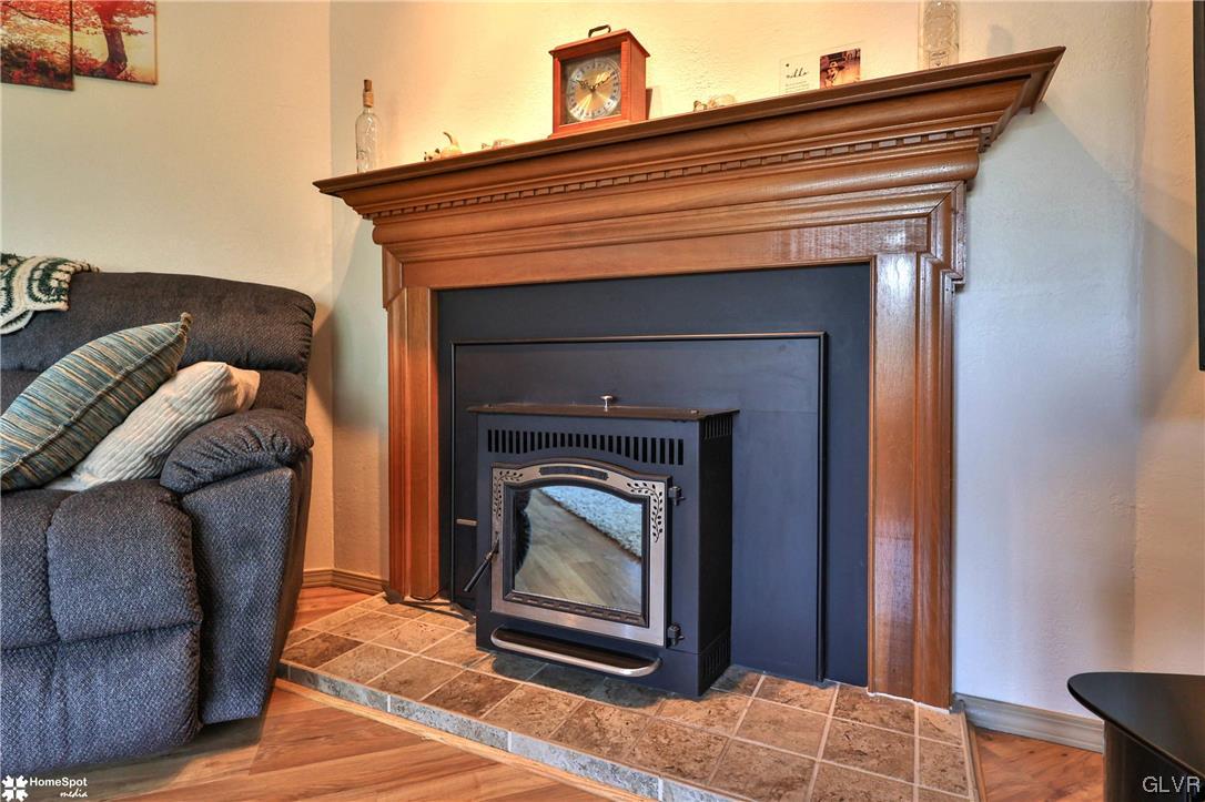 7197 Borman Road New Tripoli, PA 18066 - Photo 6 of 30 a living room with a fireplace