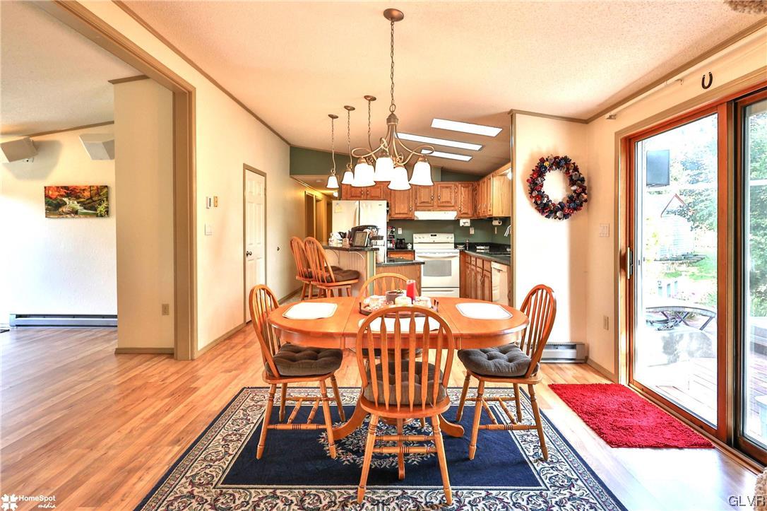 7197 Borman Road New Tripoli, PA 18066 - Photo 9 of 30 a view of a dining room with furniture and wooden floor
