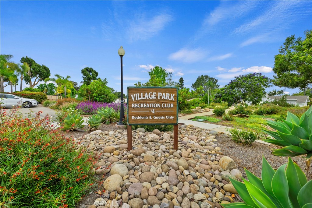 129 5 Crowns Way Encinitas, CA 92024 - Photo 35 of 43 Village park sign Rec center