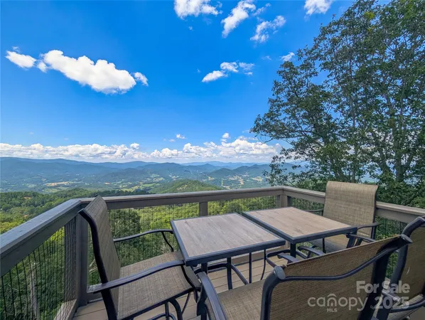 a view of a balcony with mountain view
