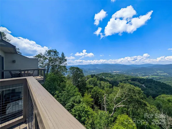 a view of a balcony with an outdoor space