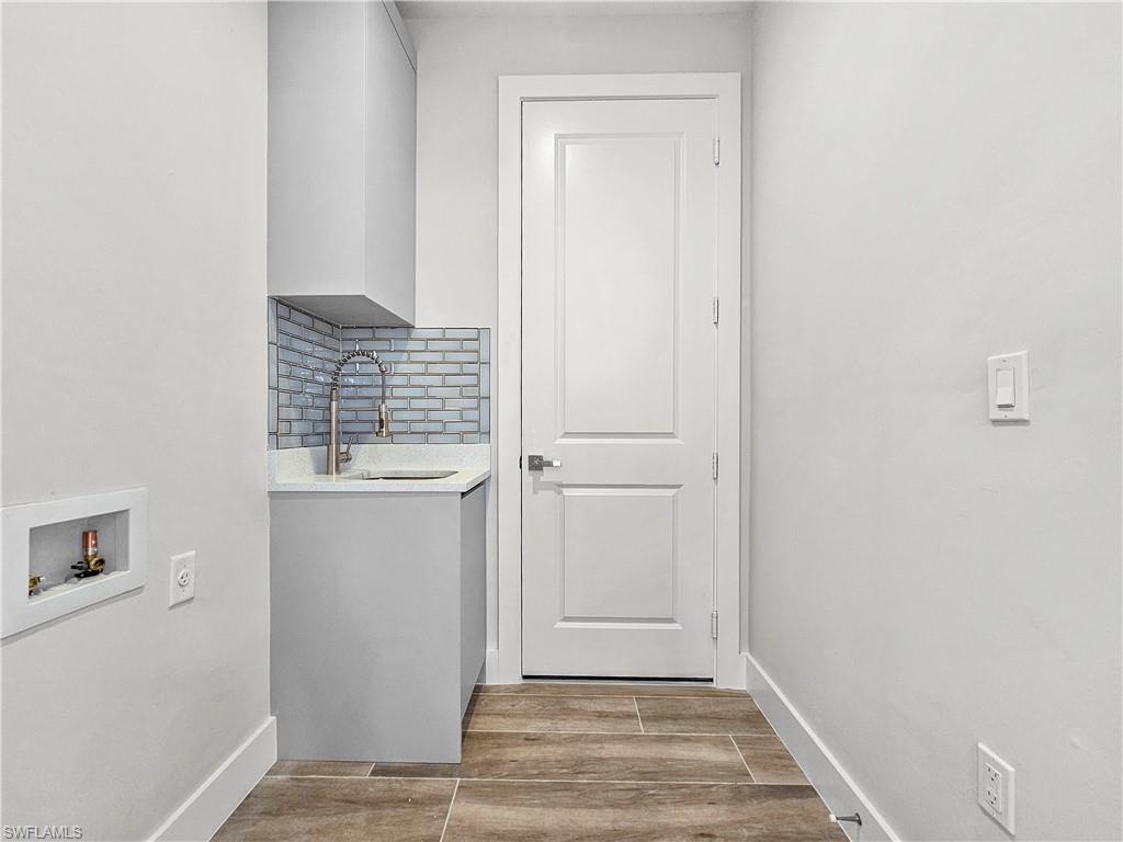 2997 28th Avenue Southeast Naples, FL 34117 - Photo 41 of 49 a view of entryway with bathroom