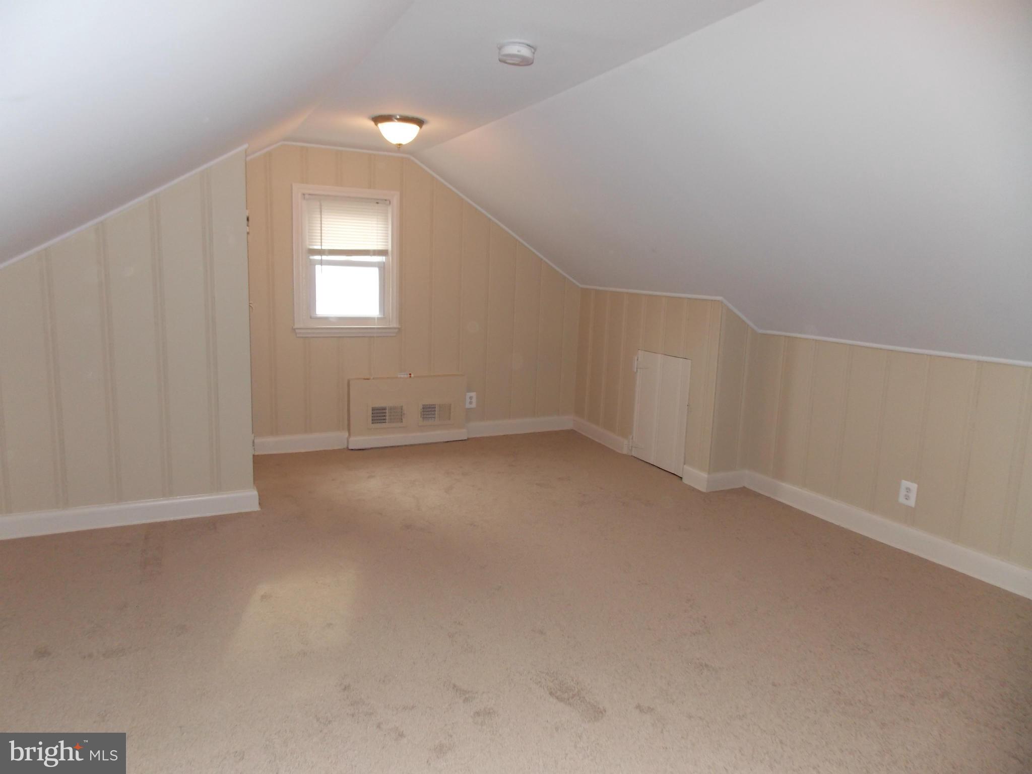 754 Charing Cross Road Baltimore, MD 21229 - Photo 12 of 15 a view of an empty room with a window