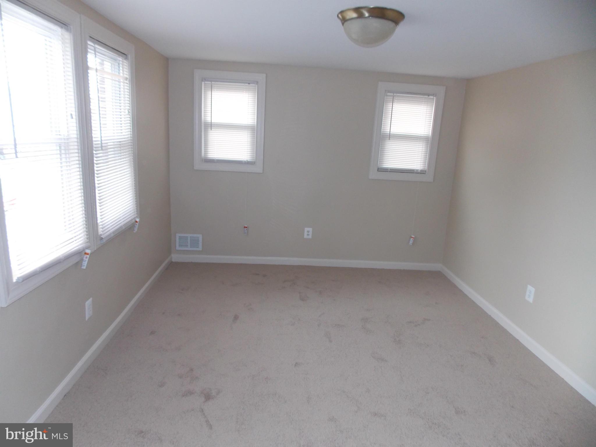 754 Charing Cross Road Baltimore, MD 21229 - Photo 7 of 15 an empty room with a window