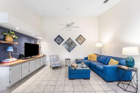 a kitchen with stainless steel appliances granite countertop a sink and a stove