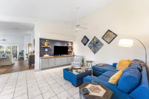 a bathroom with a double vanity sink and mirror
