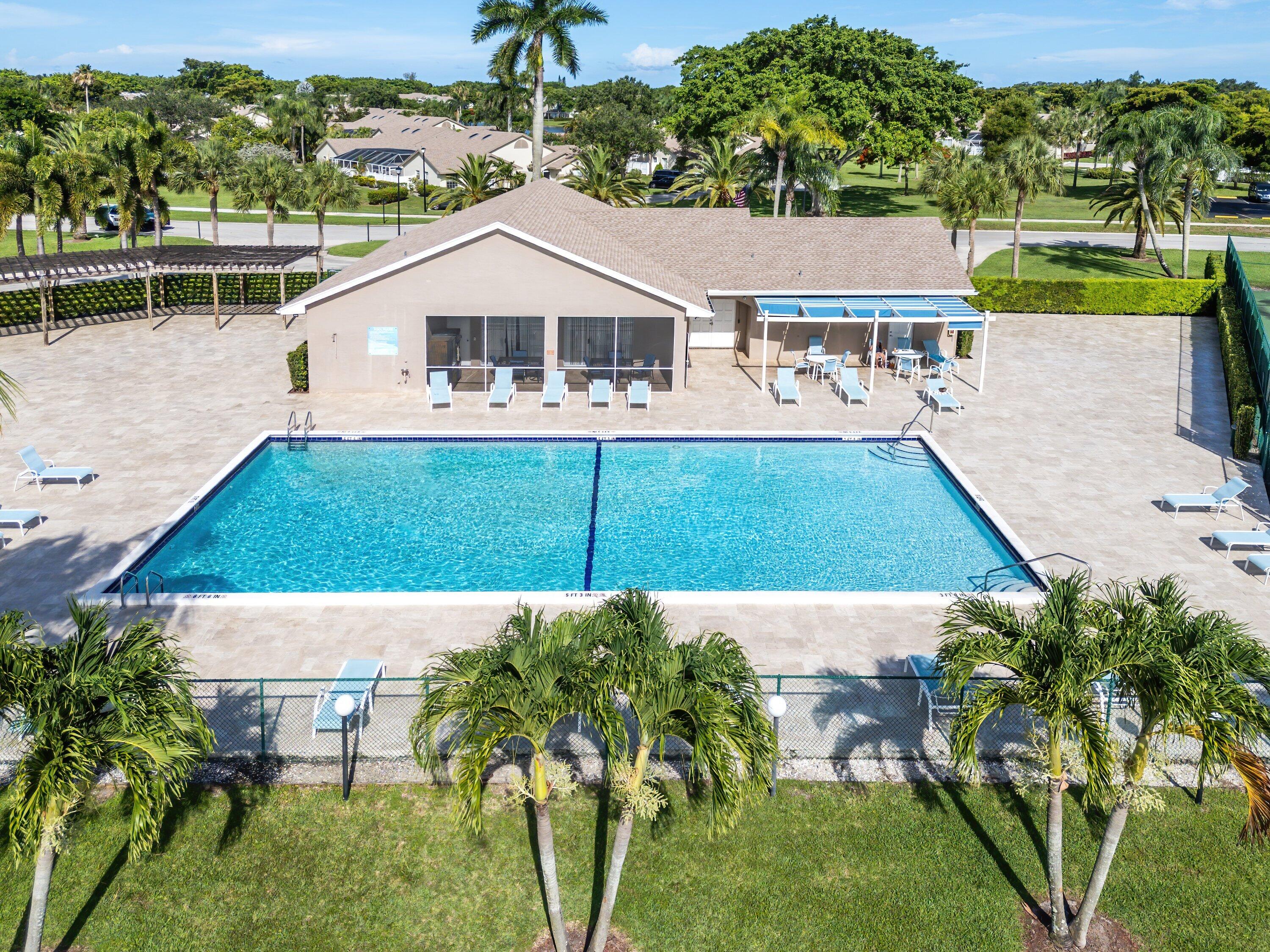 9112 Vineland Court, Unit A Boca Raton, FL 33496 - Photo 56 of 62 a aerial view of a house with a garden view
