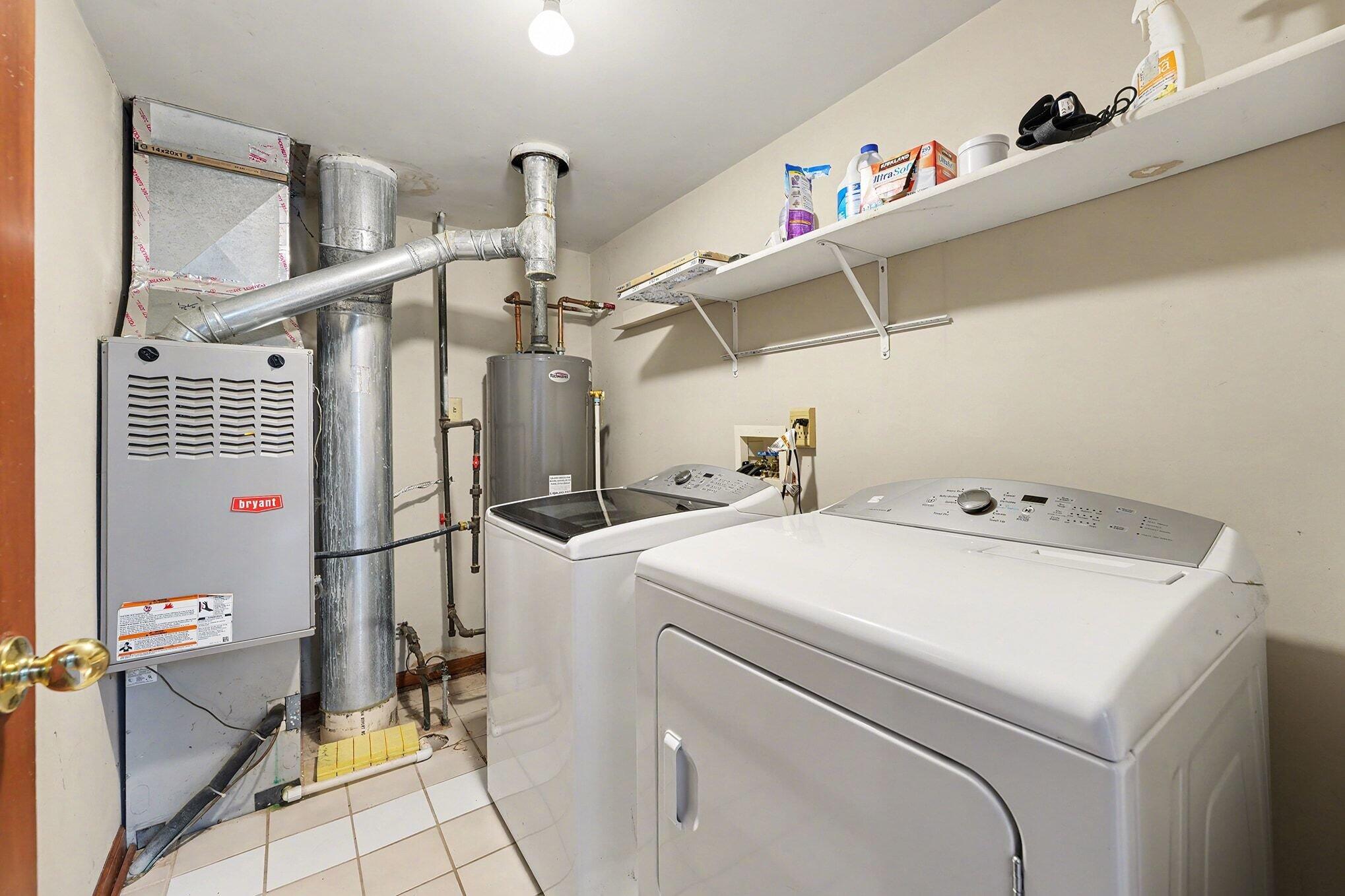 1341 West 94th Court Crown Point, IN 46307 - Photo 27 of 38 a utility room with dryer and washer