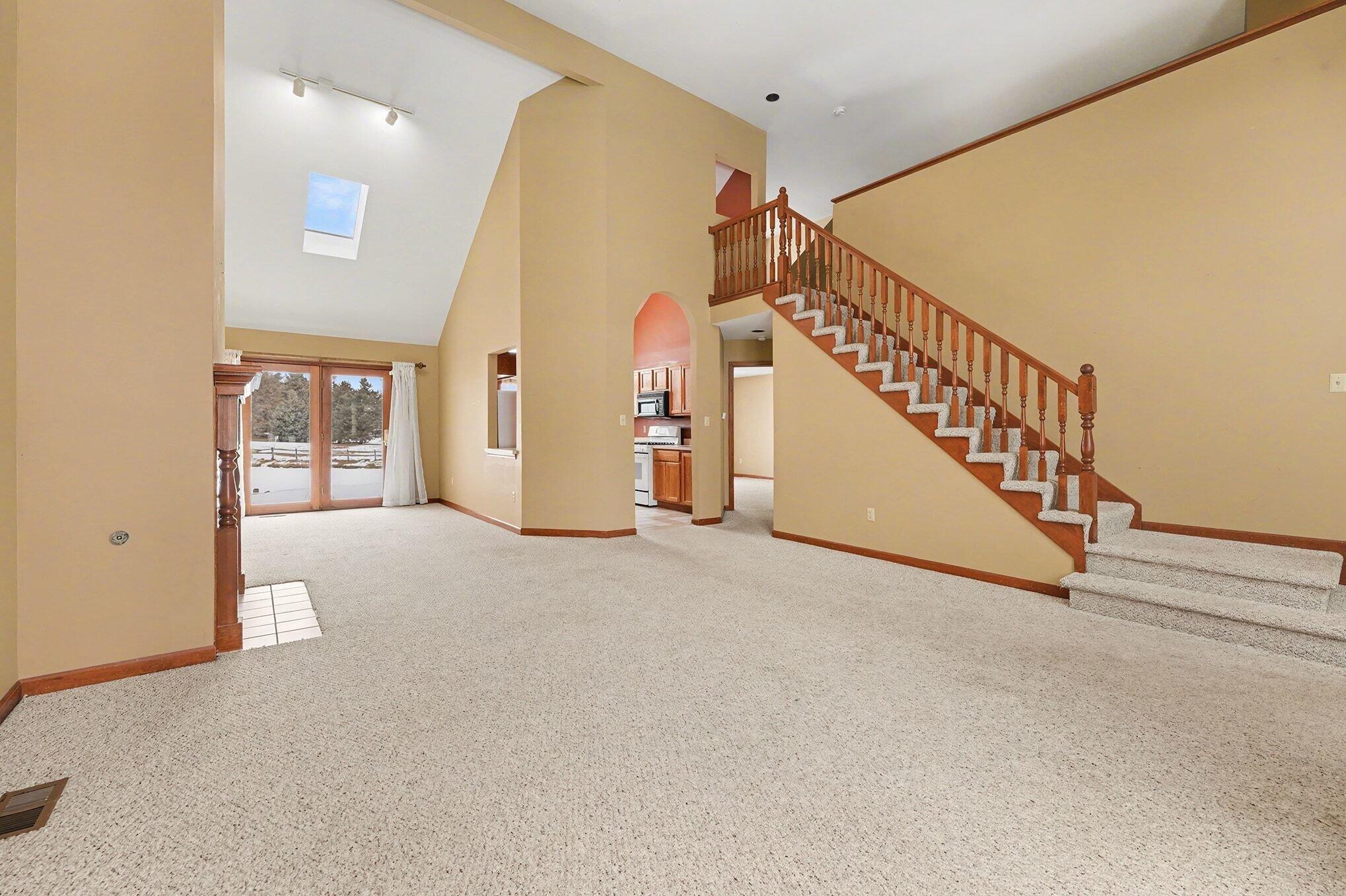 1341 West 94th Court Crown Point, IN 46307 - Photo 6 of 38 a view of a hallway with staircase