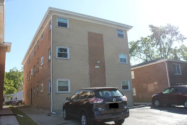 a car parked in front of a house