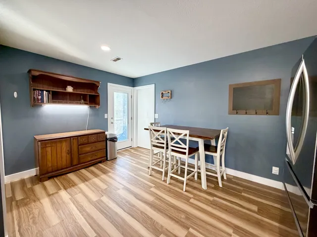 a room with furniture a flat screen tv and furniture