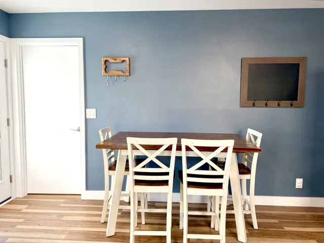 a front view of a house with wooden floor