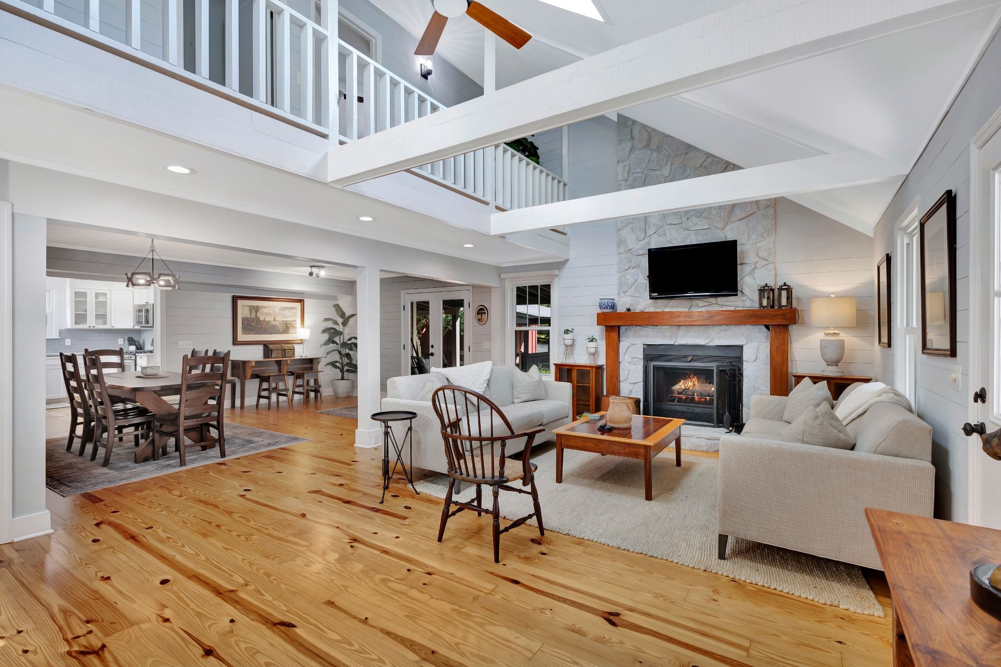 1358 Hunter Road Franklin, TN 37064 - Photo 11 of 47 a living room with furniture a fireplace and a flat screen tv