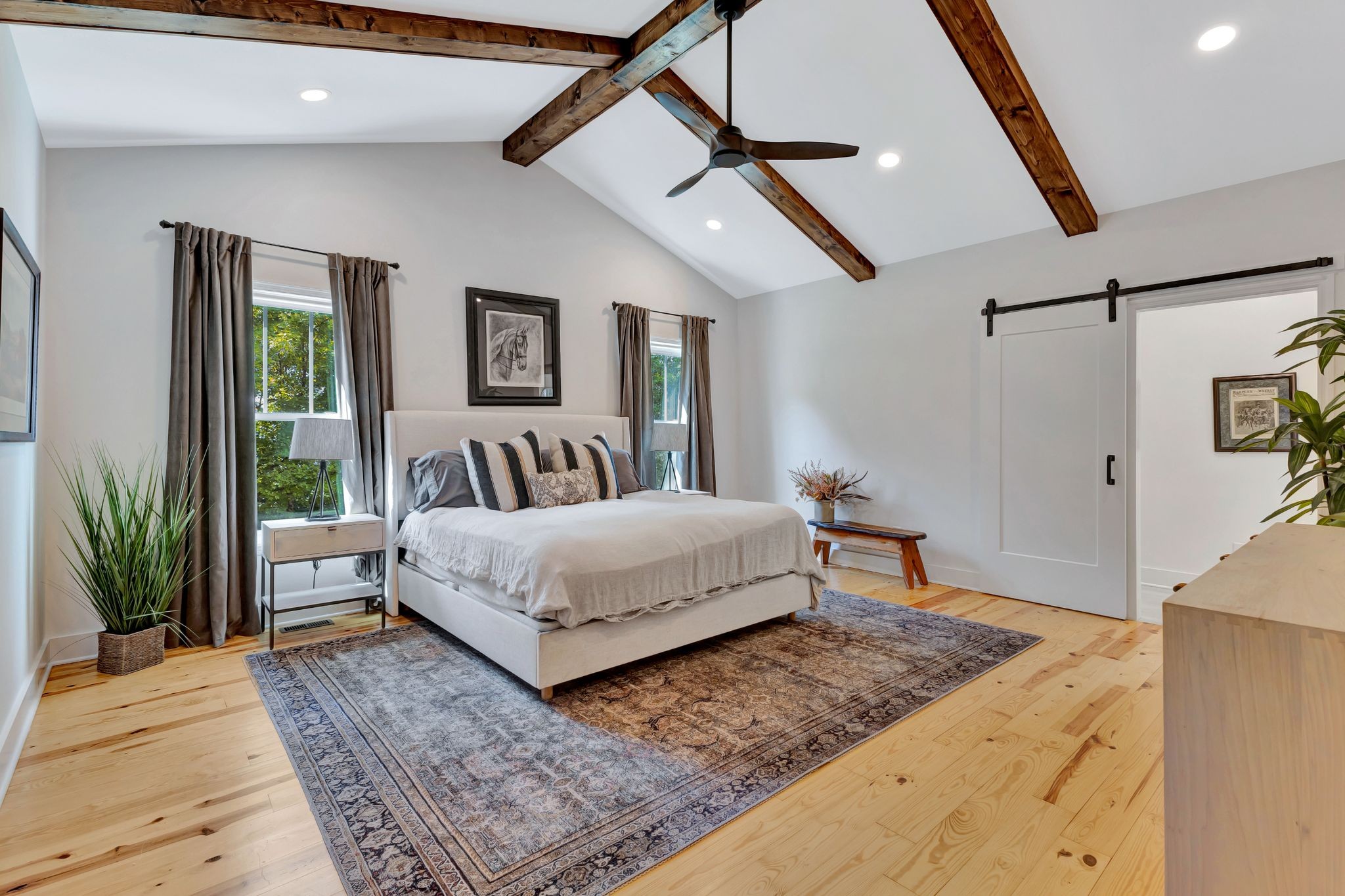1358 Hunter Road Franklin, TN 37064 - Photo 17 of 47 a spacious bedroom with a bed and a dresser next to a window