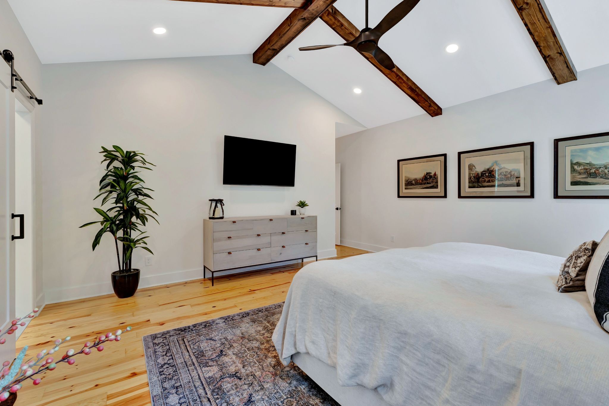 1358 Hunter Road Franklin, TN 37064 - Photo 18 of 47 a spacious bedroom with a bed and a flat screen television