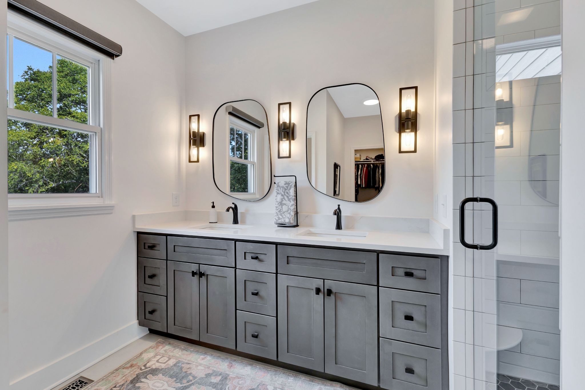 1358 Hunter Road Franklin, TN 37064 - Photo 19 of 47 a bathroom with a double vanity sink and a mirror