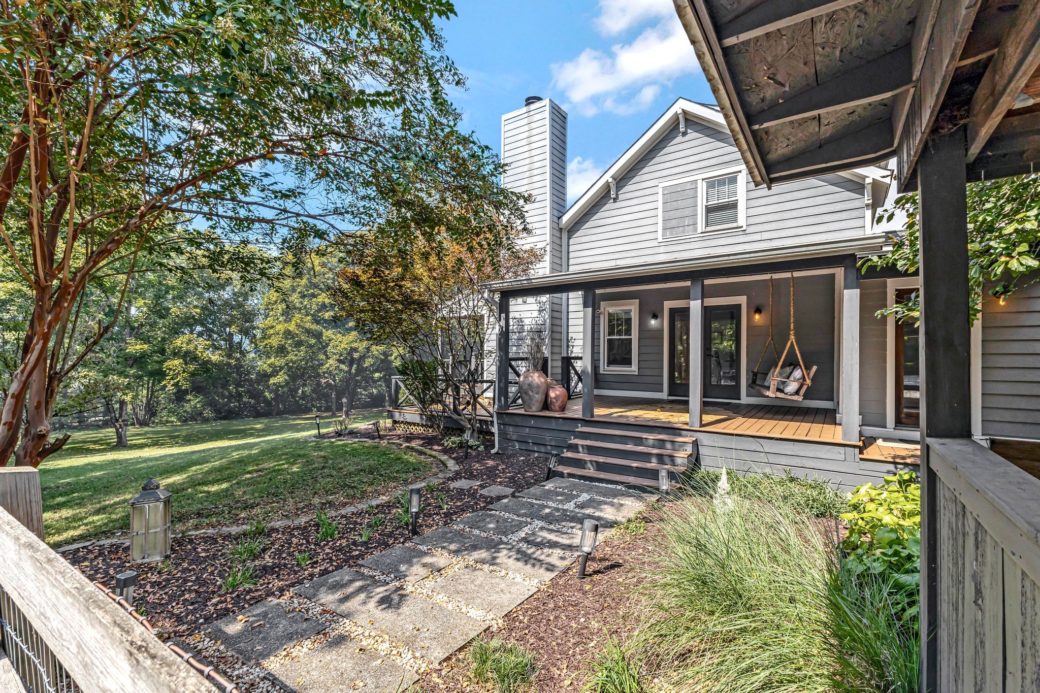 1358 Hunter Road Franklin, TN 37064 - Photo 2 of 47 a front view of a house with a yard