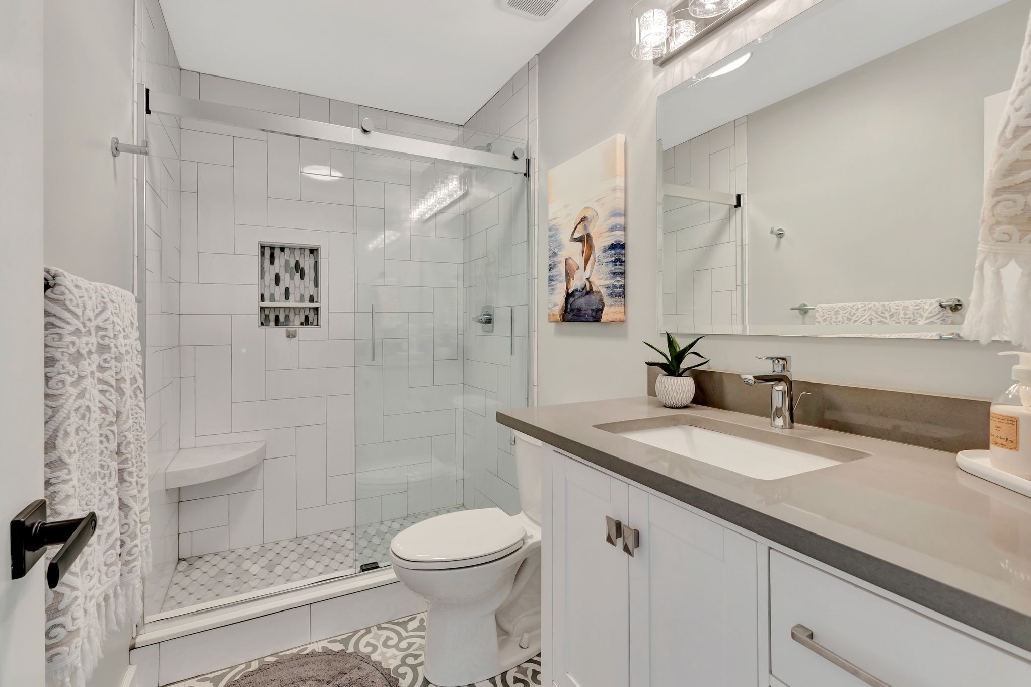 1358 Hunter Road Franklin, TN 37064 - Photo 27 of 47 a bathroom with a granite countertop sink a toilet and shower