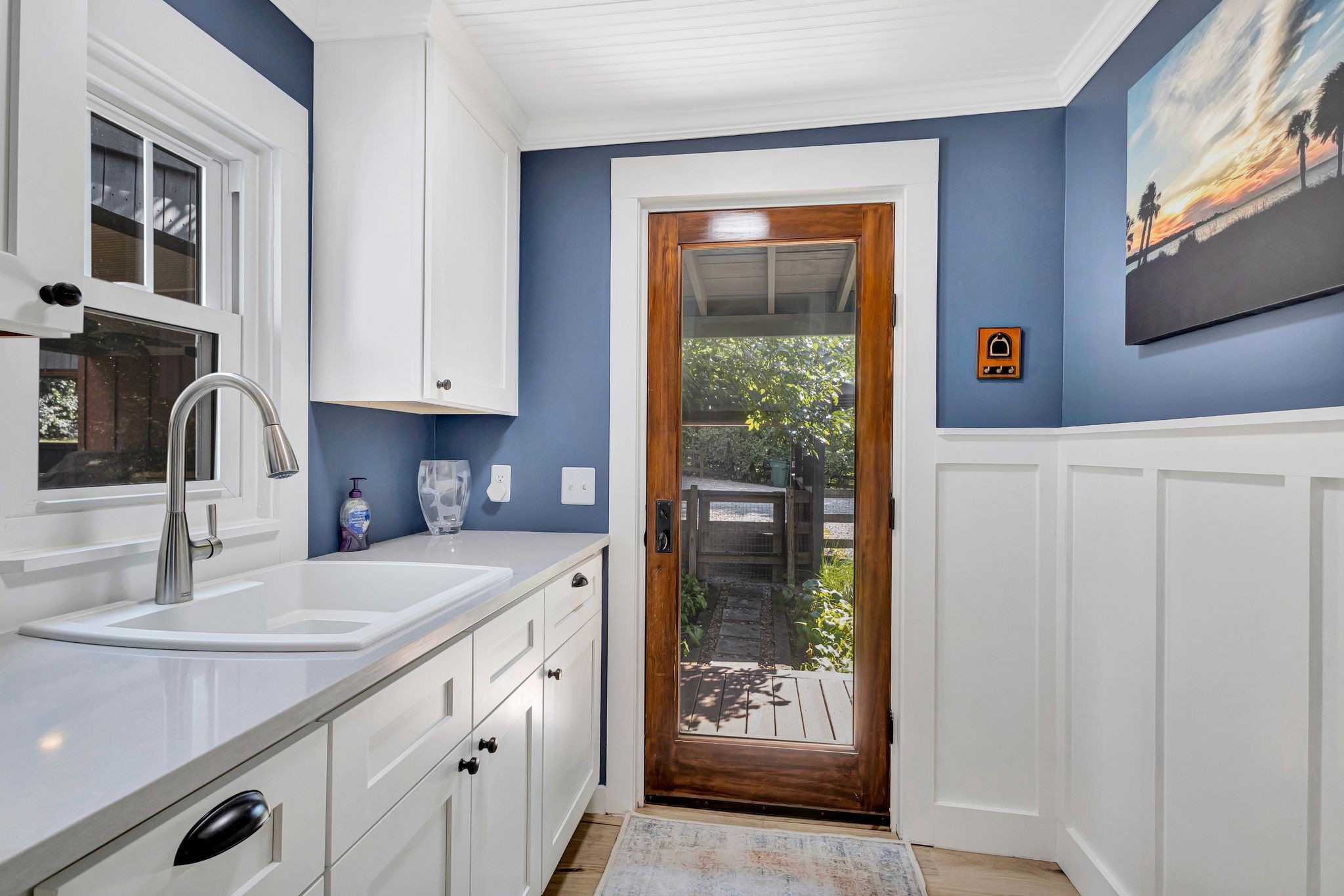 1358 Hunter Road Franklin, TN 37064 - Photo 29 of 47 a kitchen with stainless steel appliances granite countertop a sink and a refrigerator with wooden floor