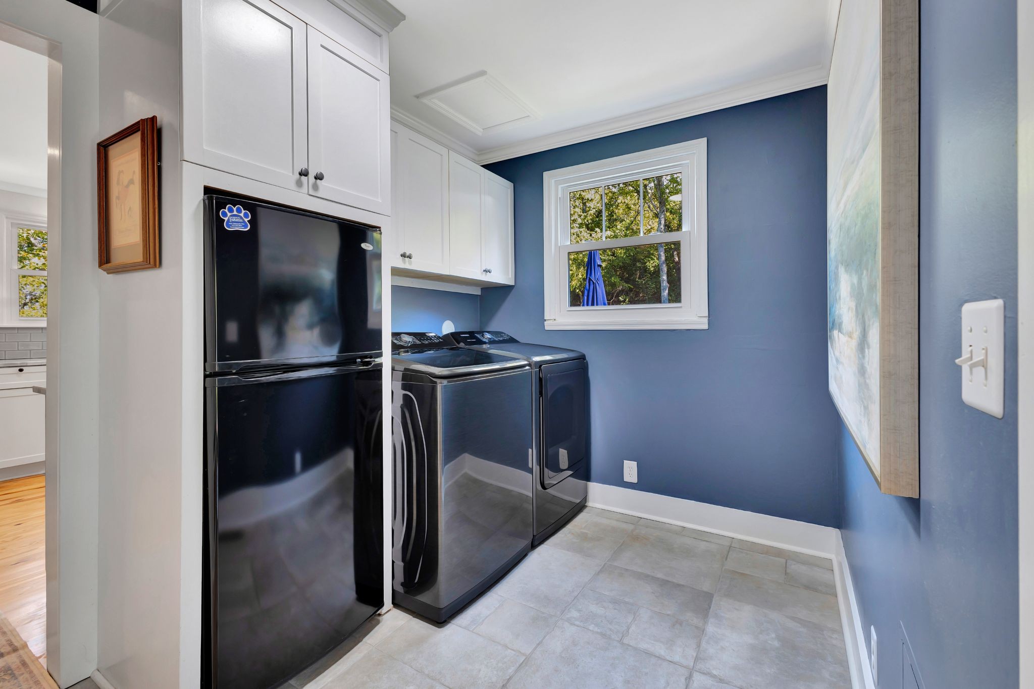 1358 Hunter Road Franklin, TN 37064 - Photo 30 of 47 a kitchen with stainless steel appliances granite countertop a refrigerator and a window