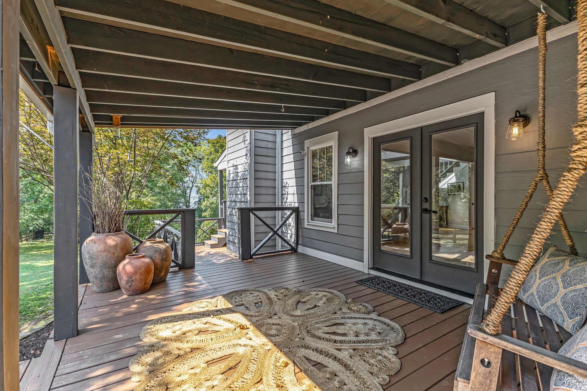 1358 Hunter Road Franklin, TN 37064 - Photo 4 of 47 a outdoor space with the couches and dining table with the garden view
