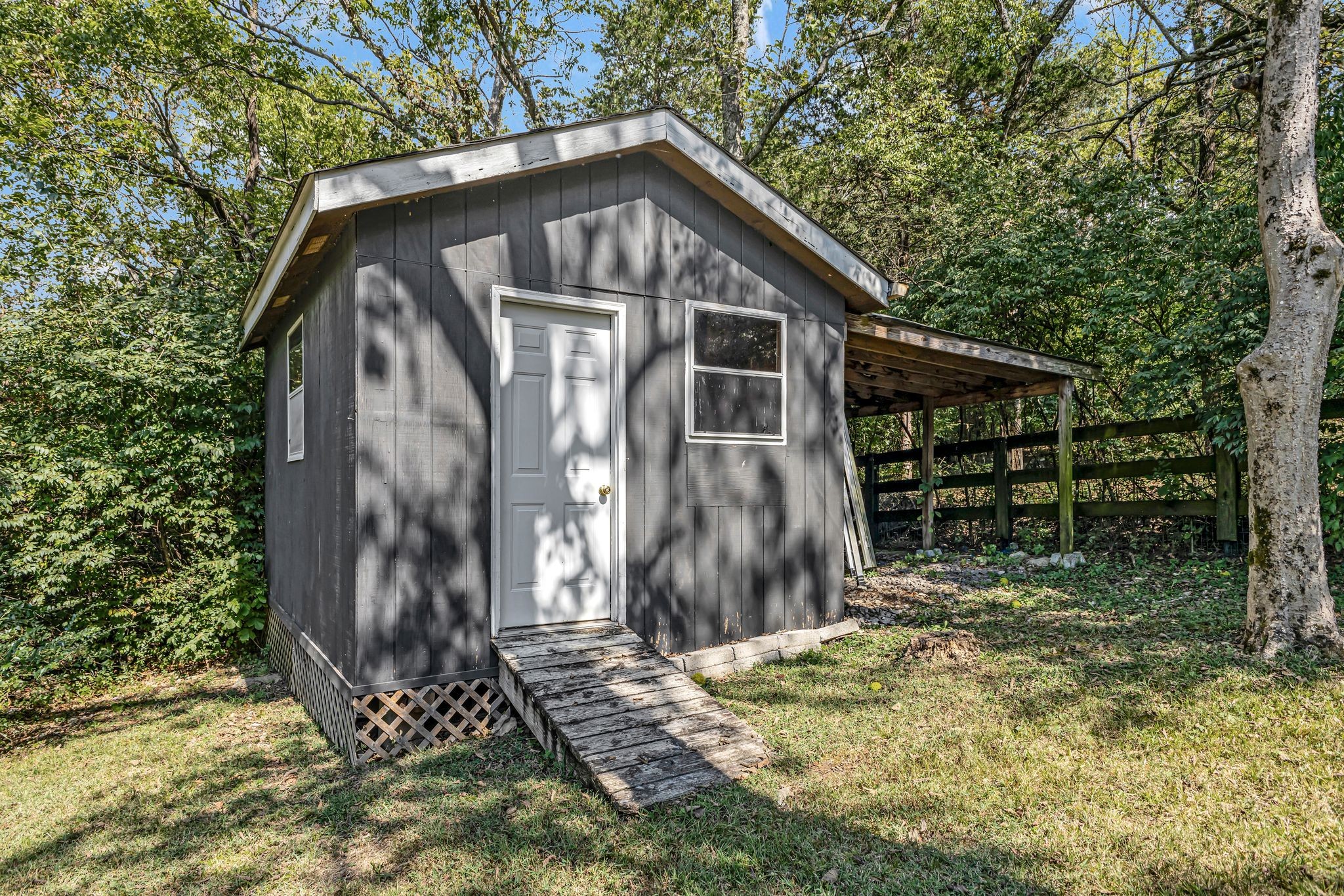 1358 Hunter Road Franklin, TN 37064 - Photo 44 of 47 a front view of a house with garden