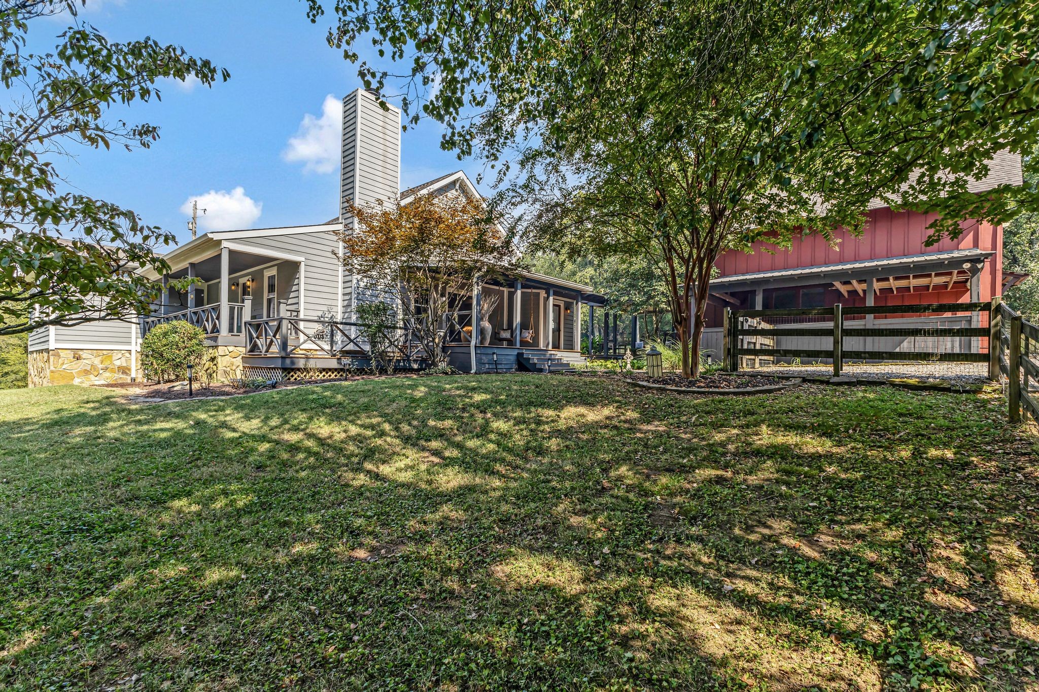 1358 Hunter Road Franklin, TN 37064 - Photo 7 of 47 a front view of a house with a yard