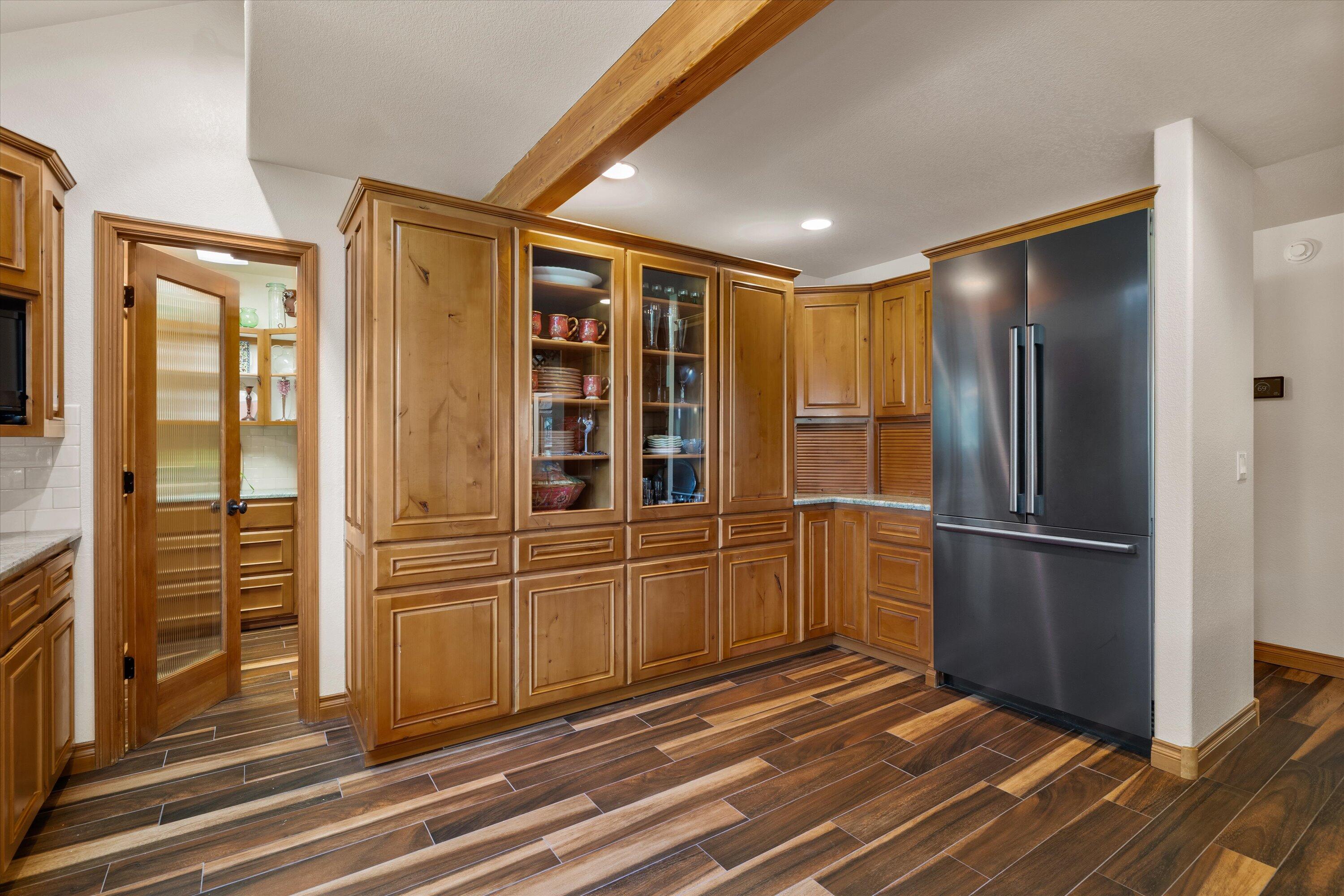 60604 Woodside Road Bend, OR 97702 - Photo 17 of 99 kitchen with pantry Tile floors over in floor heat