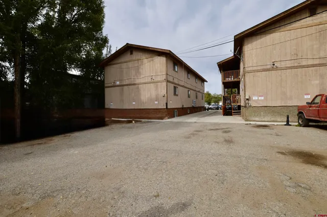 a view of a house with a big yard