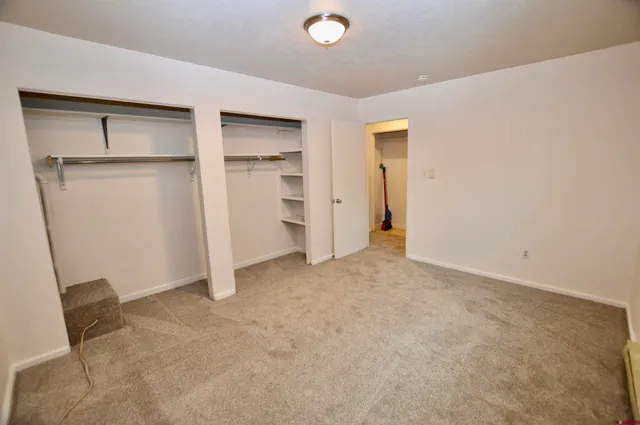 an empty room with closet