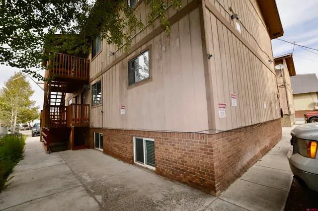 a view of a street with sitting area