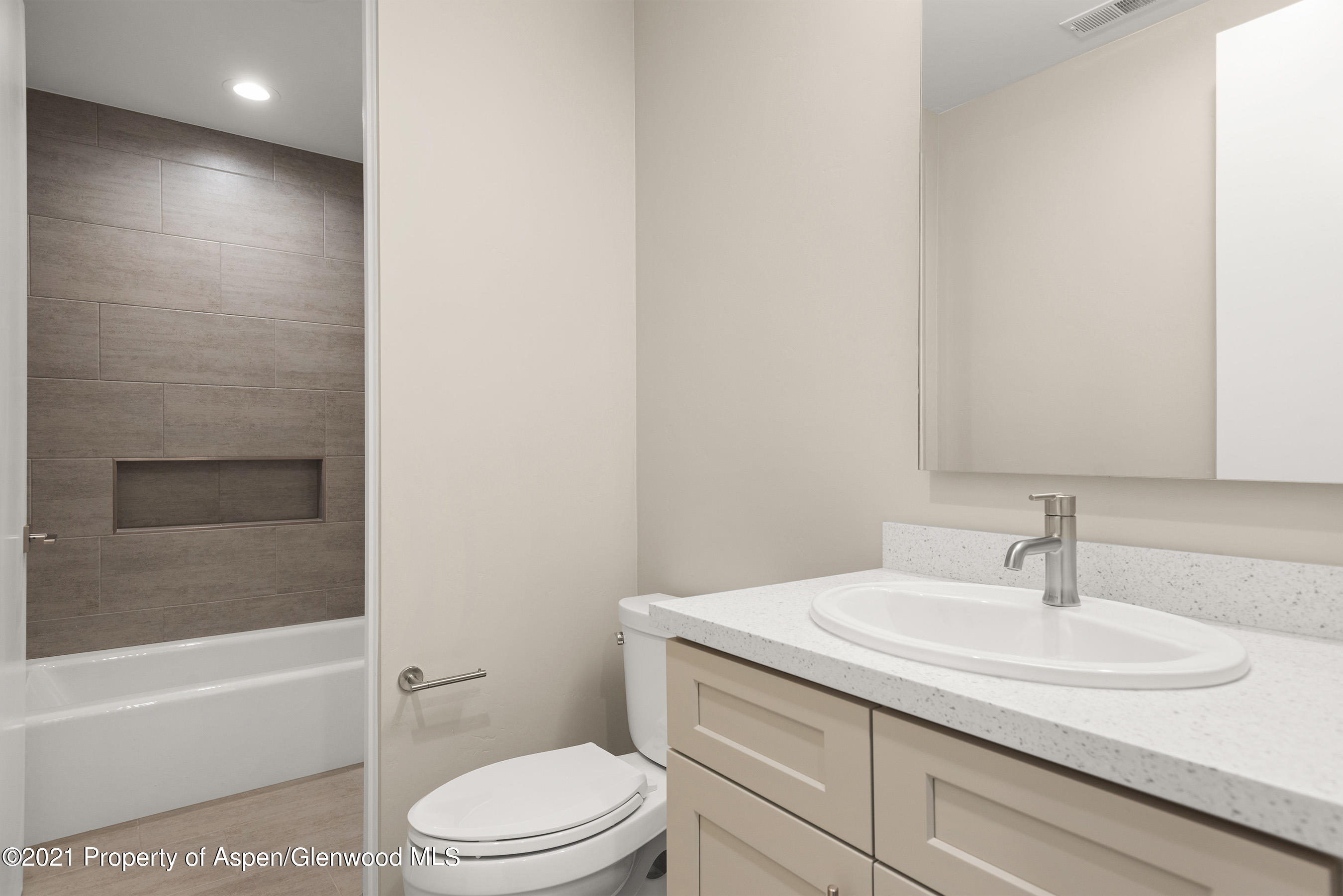 264 Overlook Ridge Carbondale, CO 81623 - Photo 29 of 39 a bathroom with a sink toilet and vanity