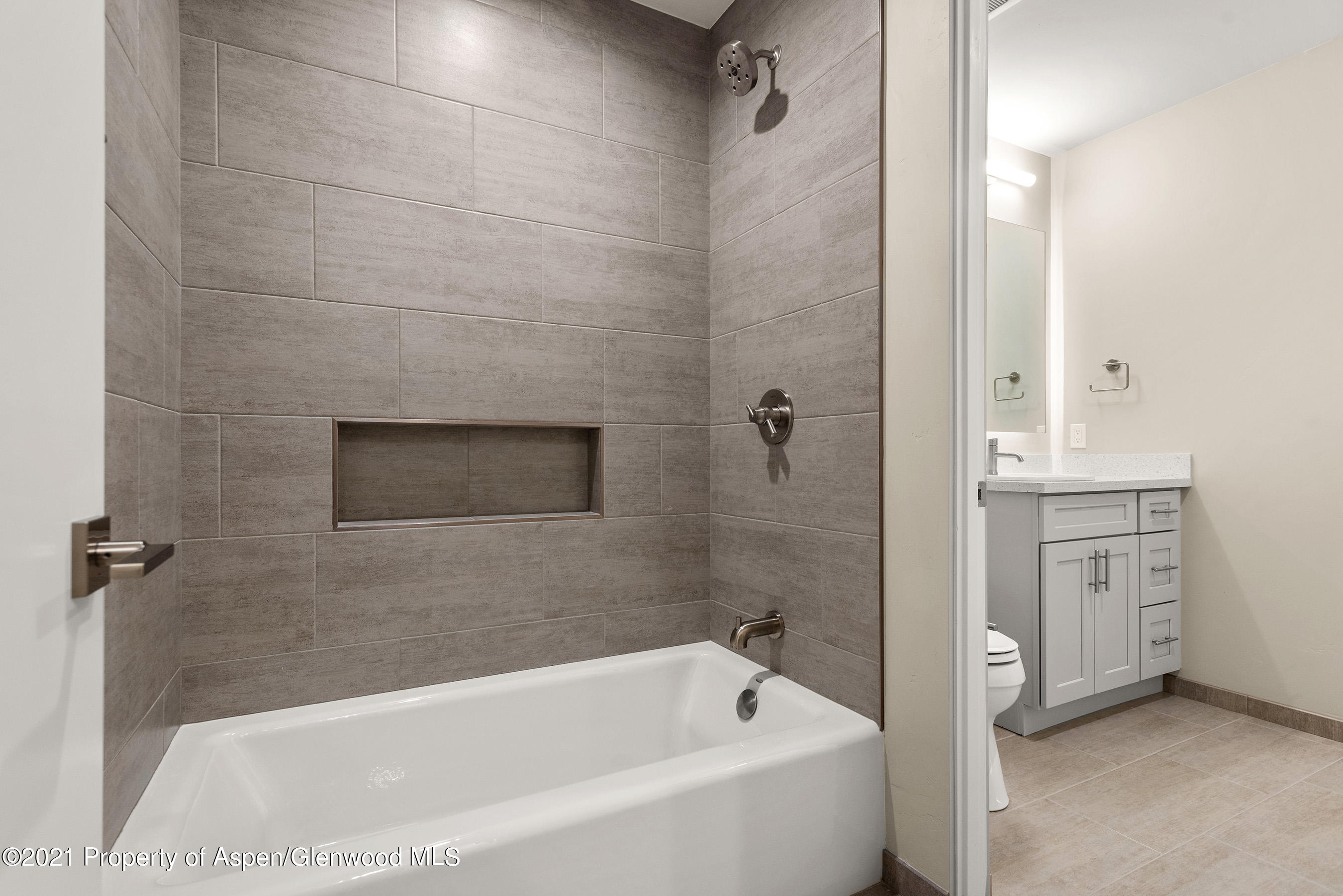 264 Overlook Ridge Carbondale, CO 81623 - Photo 30 of 39 a bathroom with a bathtub and a shower