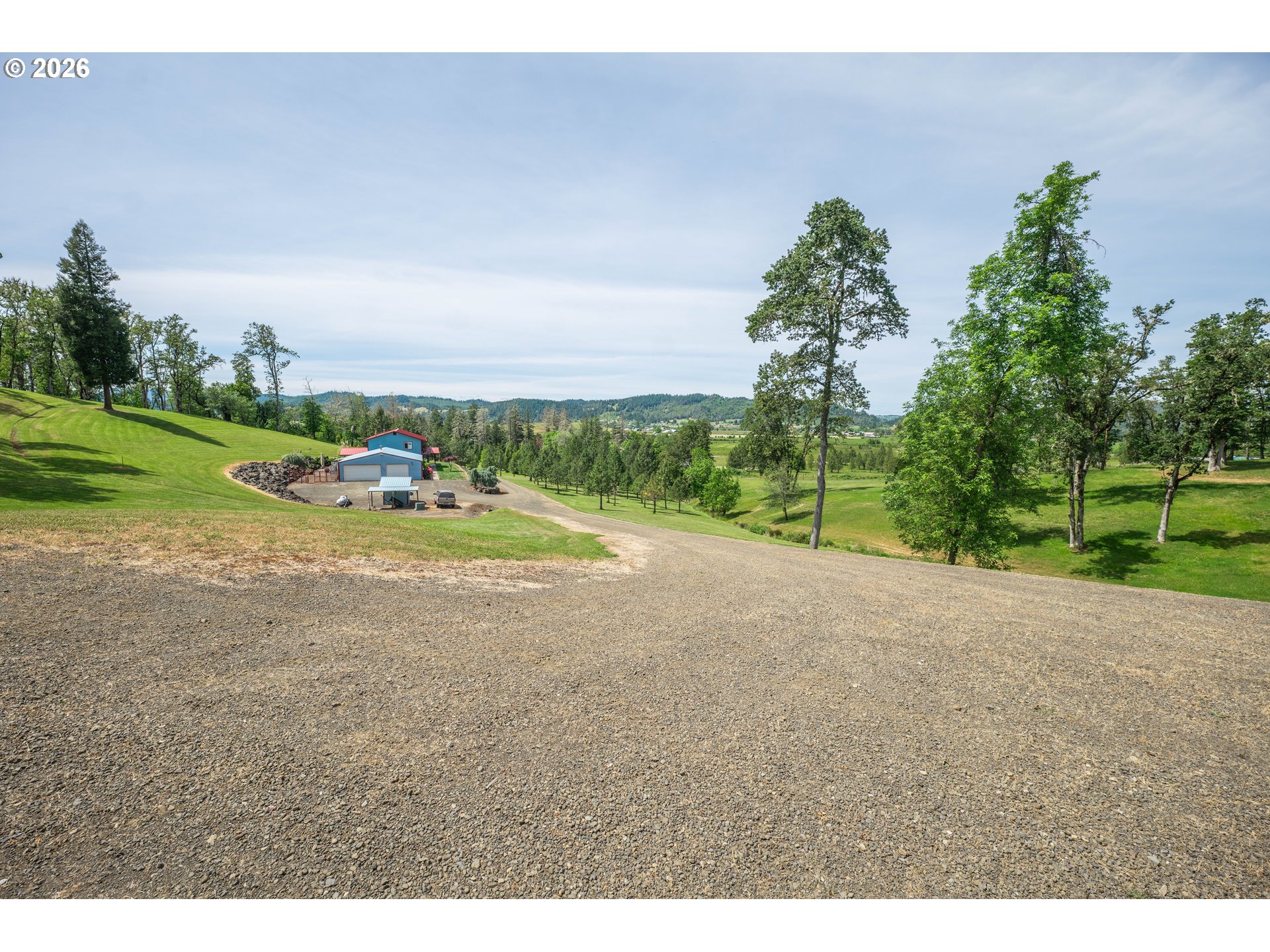489 Fir Vista Road Sutherlin, OR 97479 - Photo 43 of 47 a view of a rural road with plants and trees