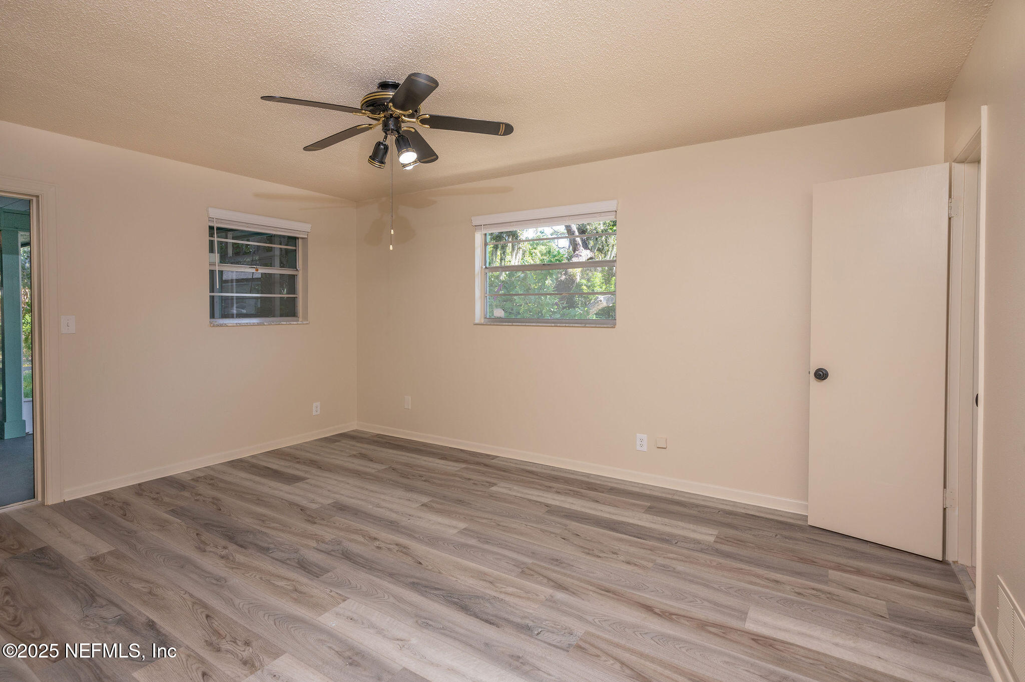 63 Hernandez Avenue Ormond Beach, FL 32174 - Photo 16 of 33 a view of an empty room with a window