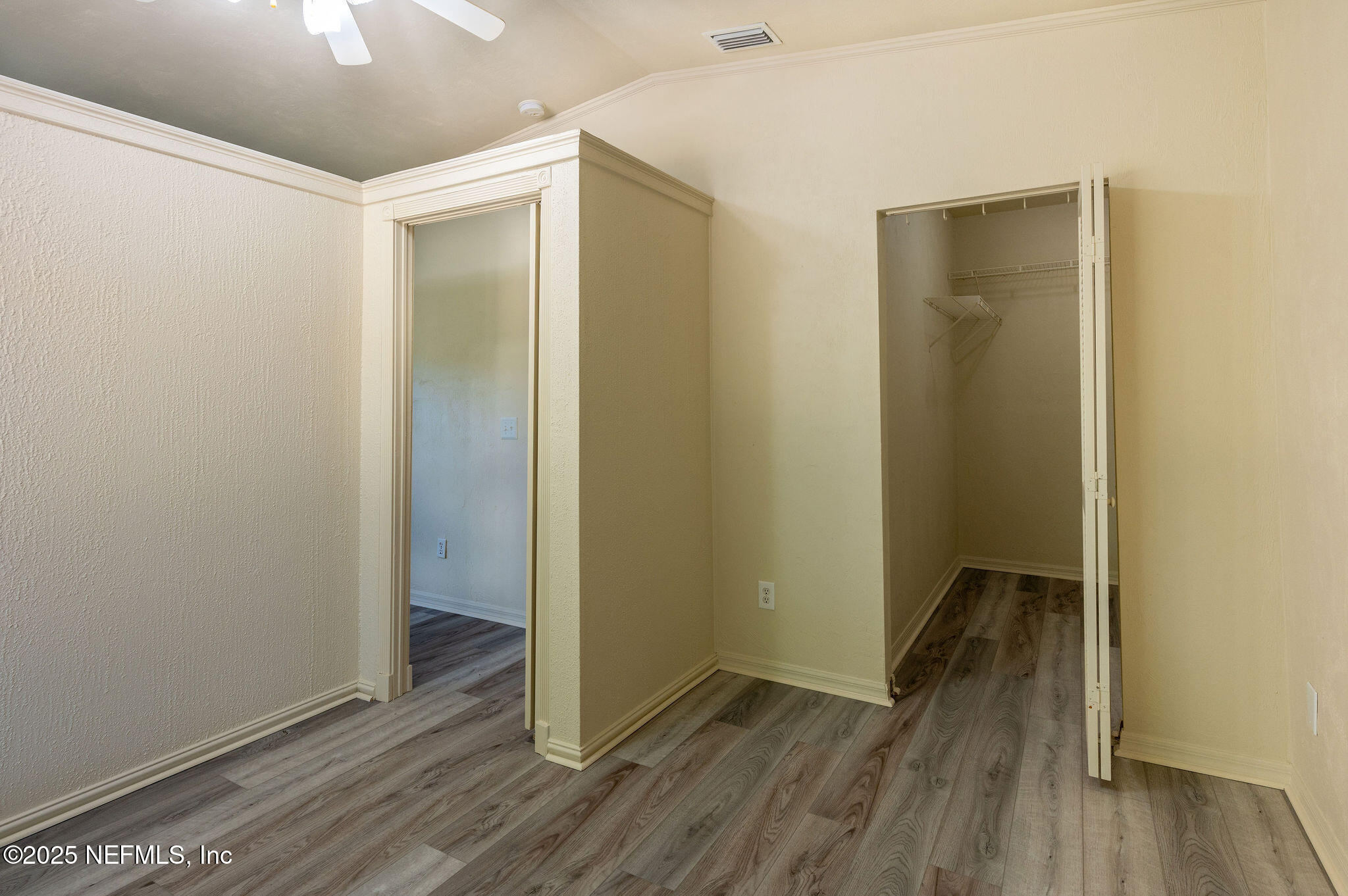 63 Hernandez Avenue Ormond Beach, FL 32174 - Photo 25 of 33 a view of hallway with wooden floor